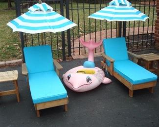 Garage: How cute are these????  Two sets of KidKraft chaise/umbrella/side table are priced separately per set.  The floating dolphin is also for sale.  Everything is now in the garage.