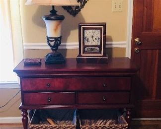 Sofa table with lamp, clock and mirror