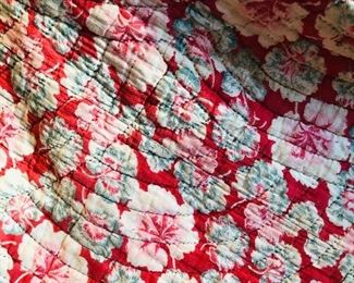 The fan pattern stitching on this handmade quilt is beautiful.