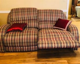 Gently used love seat recliner.