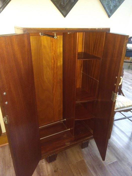 This piece is in the basement and can be used as a wardrobe, cabinet for linens, etc...