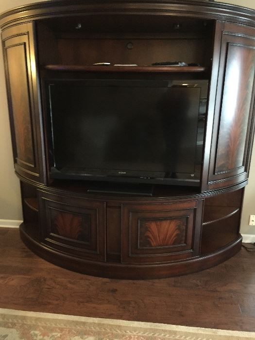 Affinity Curved Sliding Door Entertainment Center by Riverside Furniture,
Sony TV...