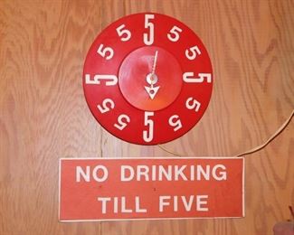 No drinking till 5 sign and  555555clock