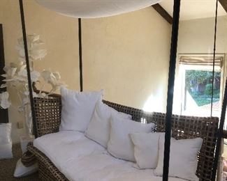 This beautiful lounge has white linens and additional custom made stripe covers..