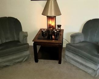 Pair of Swivel Rockers Arm Chairs and Oriental Etched Glass Top End Table with floral motif