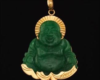 A Carved Jadeite Buddha Pendant 