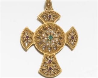 A Gold and Gemstone Cross 
