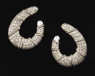 A Pair of Gold and Diamond Earrings 