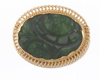 Carved Jadeite and Gold Brooch 