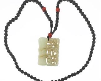 Chinese Black Onyx, Carnelian and Antique Carved Mutton Fat Jade Pendant 