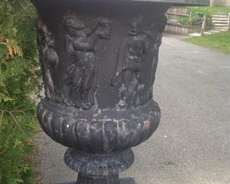 5' high cast iron urn,  two pieces.