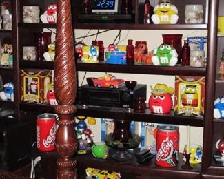 Credenza in BR 3 filled with ceramic M & M  Jars & candy dispensers & Coca Cola memorabilia