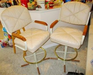 White Leather swivel bar chairs