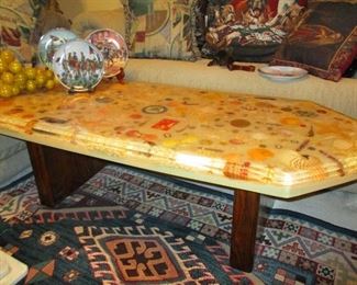 Epoxy coated coffee table inlaid with sea shells and old American coins