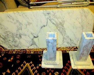 White marble coffee table from Italy with two supporting pedestal legs.  1 matching round marble lamp table.