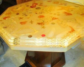 Epoxy coated lamp table (set of 3) Inlaid with sea shells and old American coins.