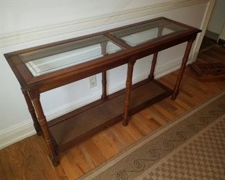 Sofa table with beveled glass and rattan insets