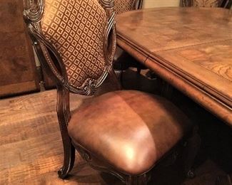 GORGEOUS FORMAL DINING TABLE, 6 CHAIRS (2 ARE CAPTAIN) AND TWO LEAFS.