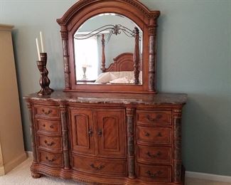 Marble top dresser and night stands. Dresser has two drawer pulls that have broken.