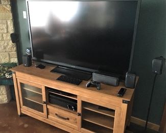 60" SHARP FLATSCREEN AND SURROUND SOUND SYSTEM AND COMPONANT CABINET.
