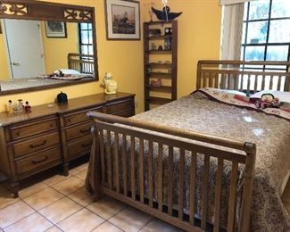Traditional triple dresser and mirror.  Queen size sleigh bed