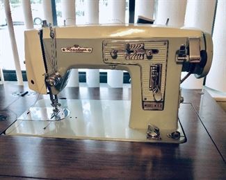 Stunningly beautiful Keystone Sewing Machine in pale mint green, almost pale blue.