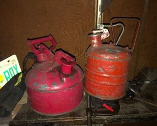 Two old metal gas cans