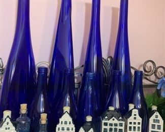 Cool Blue Bottles  $5 each and COLLECTABLE “KLM” liquor bottle houses  set of 6 - $50
