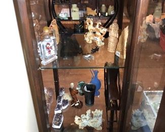 staghorn and bone  carved pieces,  antique display case, Peruvian pottery