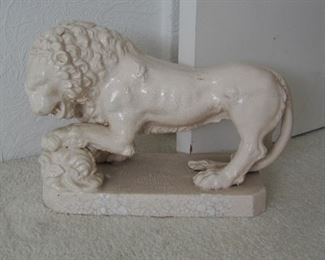 Very old lion doorstop, heavy ceramic