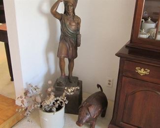 Old cigar store Indian figure on base, 4 ft. tall; old leather pig footstool
