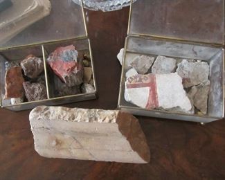 Marble column piece from Coliseum, Rome; wall fresco pieces form Pompeii; rocks