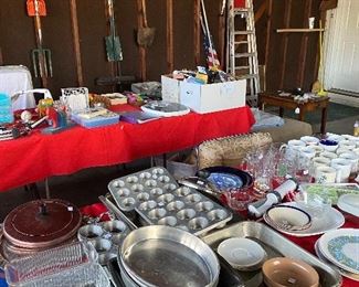 GARAGE HAS LADDERS, GARDEN TOOLS AND ASSORTED HOUSEWARES