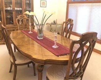 Thomasville Dining room furniture in MINT condition.   Includes China Cabinet, table and chairs. 