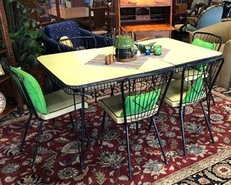 Mid Century Modern Yellow Speckled Formica Top Black Metal Table with Leaf and 6 Yellow & Black Trimmed Leather Upholstered Chairs (No Rips or Tears in Seats)