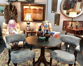 Round Wooden Table with Brass Claw Feet and a Pair of Two Adorable Chairs on Rollers