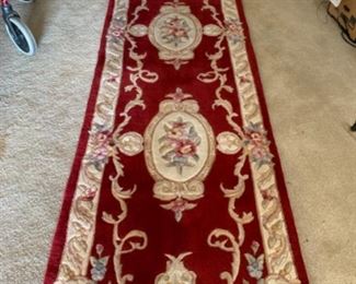 Several small wool rugs