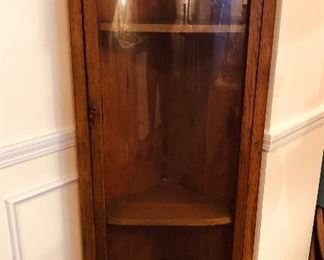 Gorgeous curved glass corner cabinet 