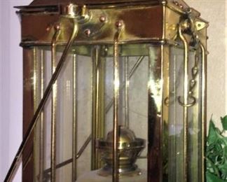 One of two brass lanterns