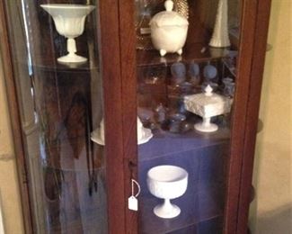 Curved front curio cabinet