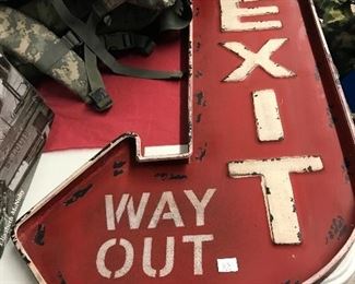 metal exit sign
 and 
military bags/equipment 