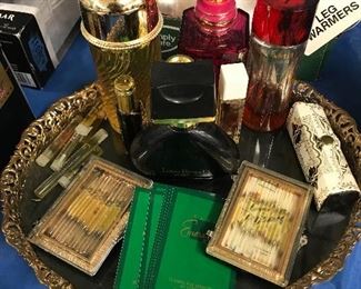 tray filled with various perfumes