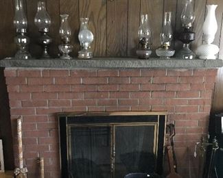 Vintage oil lamps and fireplace accessories
