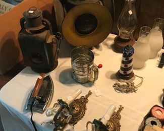 Antique railroad lamps, wall scones, antique electric iron and oil lamp globes