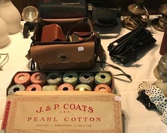 Pearl cotton thread and cameras