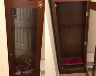 Glass-front gun cabinet with lock -- we also have a number of cases, BB guns, safety cases, and other related paraphernalia 