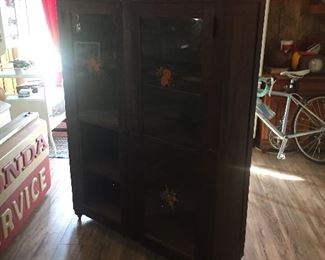 Front of Cabinet with Coca Cola Signs on back