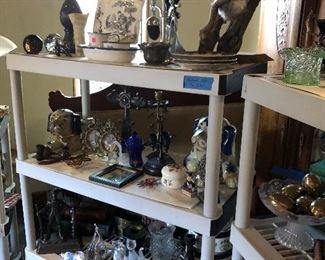 Big blue ceramic dogs, taxidermy fox head, Christian Cross, etc