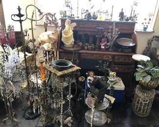 Brass decor, Victorian-style, roll-top desk, plant stands, candlesticks, metal flowers, etc