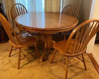 Oak table with extra leave.